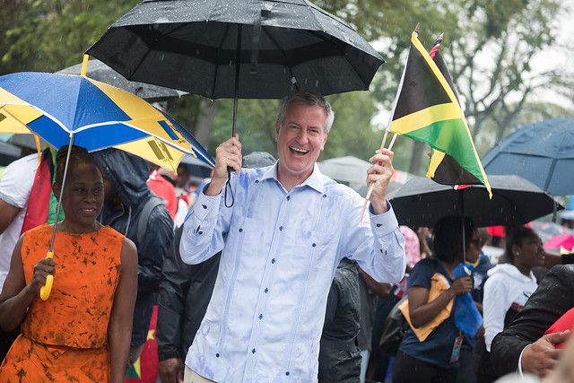Mayor Bill de Blasio and Chirlane McCray march in the 2019 West Indian Day Parade.
